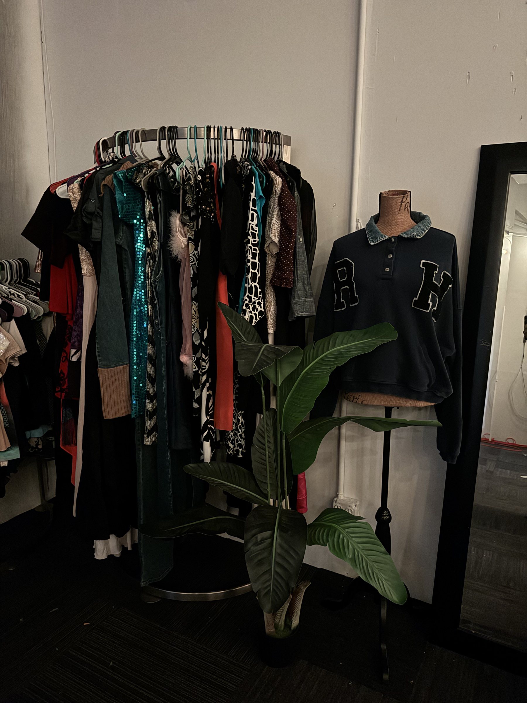 Curated clothing racks inside Reed's Raghouse private sourcing studio